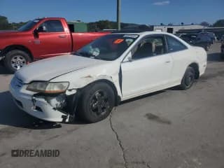 ✅ 2002 Honda Accord EX • VIN: 1HGCG32542A011293 • Lot: 80450935. Listed on Copart with 249,312 mi. Free auction sales archive from the USA and detailed vehicle history report at DreamBid. Image 1.