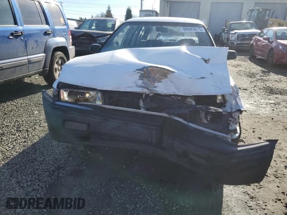 ✅ 1991 Toyota Corolla • VIN: JT2AE94K5M3485707 • Lot: 88983675. Wystawiony na Copart z przebiegiem 205 702 mil. Bezpłatny archiwum sprzedaży aukcyjnych z USA i szczegółowy raport historii pojazdu na DreamBid. Zdjęcie 5.