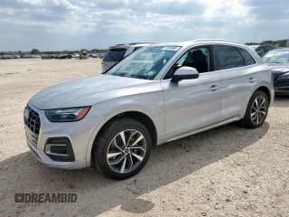 ✅ 2021 Audi Q5 Premium Plus • VIN: WA1BAAFY1M2052444 • Lot: 71654685. Wystawiony na Copart z przebiegiem 79 056 mil. Bezpłatny archiwum sprzedaży aukcyjnych z USA i szczegółowy raport historii pojazdu na DreamBid. Zdjęcie 1.