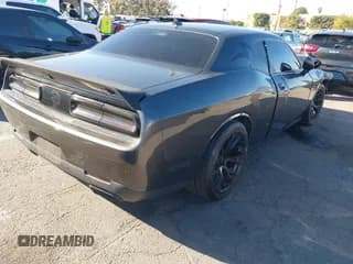 ✅ 2016 Dodge Challenger SRT Hellcat • VIN: 2C3CDZC93GH270902 • Lot: 43863546. Listed on IAAI with 33,410 mi. Free auction sales archive from the USA and detailed vehicle history report at DreamBid. Image 4.