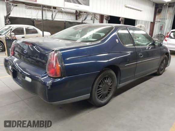 ✅ 2002 Chevrolet Monte Carlo LS • VIN: 2G1WW12E529151568 • Lot: 42482908. Listed on IAAI with 133,296 mi. Free auction sales archive from the USA and detailed vehicle history report at DreamBid. Image 4.