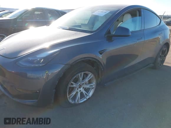 ✅ 2023 Tesla Model Y Long Range • VIN: 7SAYGAEEXPF714760 • Lot: 41748398. Listed on IAAI with 49,802 mi. Free auction sales archive from the USA and detailed vehicle history report at DreamBid. Image 6.