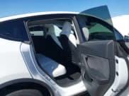 ✅ 2023 Tesla Model Y Long Range • VIN: 7SAYGDEE1PF826879 • Lot: 43393771. Listed on IAAI with 35,091 mi. Free auction sales archive from the USA and detailed vehicle history report at DreamBid. Image 8.