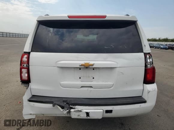 ✅ 2020 Chevrolet Suburban LS • VIN: 1GNSCGEC0LR225957 • Lot: 64193324. Wystawiony na Copart z przebiegiem 82 347 mil. Bezpłatny archiwum sprzedaży aukcyjnych z USA i szczegółowy raport historii pojazdu na DreamBid. Zdjęcie 6.
