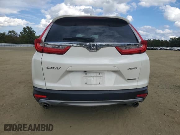 ✅ 2017 Honda CR-V Touring • VIN: 2HKRW2H93HH650606 • Лот: 82220585. Опубликован ранее на Copart с пробегом 34 827 миль. Бесплатный доступ к архиву аукционных продаж из США и подробный отчёт об истории автомобиля на DreamBid. Изображение 6.