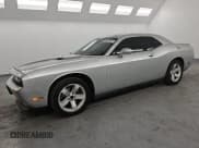 ✅ 2012 Dodge Challenger SXT • VIN: 2C3CDYAG9CH257836 • Lot: 41896165. Wystawiony na Copart z przebiegiem 124 813 mil. Bezpłatny archiwum sprzedaży aukcyjnych z USA i szczegółowy raport historii pojazdu na DreamBid. Zdjęcie 1.