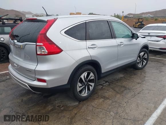 ✅ 2016 Honda CR-V Touring • VIN: 5J6RM3H90GL031090 • Lot: 43217183. Wystawiony na IAAI z przebiegiem 50 697 mil. Bezpłatny archiwum sprzedaży aukcyjnych z USA i szczegółowy raport historii pojazdu na DreamBid. Zdjęcie 4.