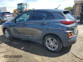 ✅ 2020 Hyundai Kona SE • VIN: KM8K12AA0LU502797 • Лот: 57085974. Опубликован ранее на Copart с пробегом 124 593 миль. Бесплатный доступ к архиву аукционных продаж из США и подробный отчёт об истории автомобиля на DreamBid. Изображение 2.
