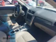 ✅ 2010 Ford Fusion Hybrid • VIN: 3FADP0L3XAR185989 • Lot: 43156692. Listed on IAAI with 226,637 mi. Free auction sales archive from the USA and detailed vehicle history report at DreamBid. Image 5.