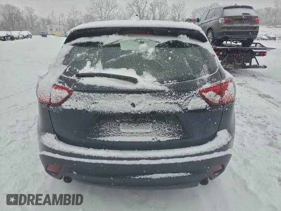 ✅ 2014 Mazda CX-5 Sport • VIN: JM3KE2BEXE0409555 • Lot: 94664815. Listed on Copart with 117,572 mi. Free auction sales archive from the USA and detailed vehicle history report at DreamBid. Image 6.