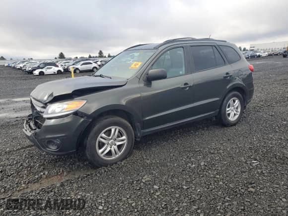 ✅ 2012 Hyundai Santa Fe GLS • VIN: 5XYZGDAB0CG105078 • Лот: 90475405. Размещён на Copart с пробегом 101 439 миль миль. Получите бесплатный доступ к архиву аукционных продаж из США и посмотрите подробный отчёт об истории автомобиля на DreamBid. Изображение 1.