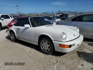 ✅ 1990 Porsche 911 • VIN: WP0CB2968LS470327 • Лот: 76689234. Опубликован ранее на Copart с пробегом 42 640 миль. Бесплатный доступ к архиву аукционных продаж из США и подробный отчёт об истории автомобиля на DreamBid. Изображение 4.