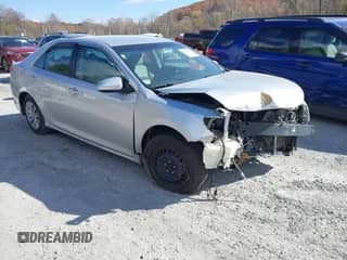 2012 Toyota Camry LE with VIN 4T1BF1FK7CU006571, listed as a IAAI auction lot 43580709 with 256,798 mi miles and . Bid and sale history available at DreamBid. Image 1.