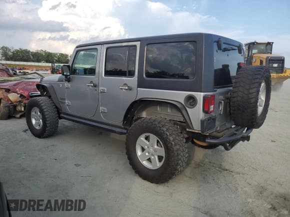 ✅ 2016 Jeep Wrangler Unlimited Sport • VIN: 1C4BJWDG2GL185774 • Lot: 57407015. Listed on Copart with 124,568 mi. Free auction sales archive from the USA and detailed vehicle history report at DreamBid. Image 2.