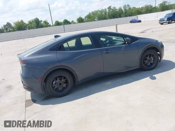 2024 Toyota Prius LE with VIN JTDACAAUXR3032131, listed as a IAAI auction lot 43231631 with 15,535 mi miles and . Bid and sale history available at DreamBid. Image 4.