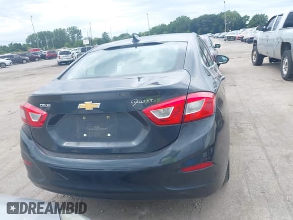 ✅ 2018 Chevrolet Cruze LT • VIN: 1G1BE5SM3J7154193 • Лот: 43103768. Опубликован ранее на IAAI с пробегом 56 871 миль. Бесплатный доступ к архиву аукционных продаж из США и подробный отчёт об истории автомобиля на DreamBid. Изображение 16.