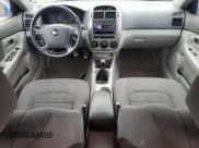 ✅ 2006 Kia Spectra • VIN: KNAFE161X65365733 • Lot: 56942305. Wystawiony na Copart z przebiegiem 162 452 mil. Bezpłatny archiwum sprzedaży aukcyjnych z USA i szczegółowy raport historii pojazdu na DreamBid. Zdjęcie 8.