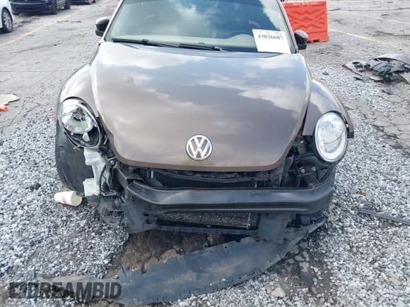 ✅ 2014 Volkswagen Beetle 1.8T • VIN: 3VWJ07AT2EM664064 • Lot: 43036687. Listed on IAAI with 112,000 mi. Free auction sales archive from the USA and detailed vehicle history report at DreamBid. Image 6.