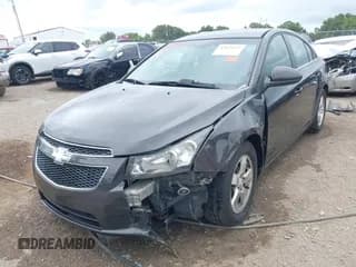 ✅ 2014 Chevrolet Cruze 1LT • VIN: 1G1PC5SB4E7195142 • Lot: 43022219. Listed on IAAI with 148,506 mi. Free auction sales archive from the USA and detailed vehicle history report at DreamBid. Image 2.