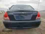 2005 Hyundai Elantra GLS z VIN KMHDN46D75U146640, wystawiony jako Copart lot #81188684 z przebiegiem 223 869 mil mil oraz Szkoda całkowita • Salvage title. Historia ofert i sprzedaży dostępna na DreamBid. Obrazek 6.