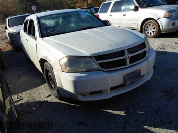 ✅ 2008 Dodge Avenger SE • VIN: 1B3LC46K28N210829 • Lot: 43498861. Listed on IAAI with 348,834 mi. Free auction sales archive from the USA and detailed vehicle history report at DreamBid. Image 1.