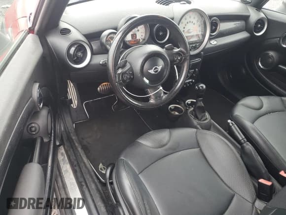 ✅ 2012 MINI Convertible S • VIN: WMWZP3C50CT249815 • Лот: 61056795. Опубликован ранее на Copart с пробегом 137 999 миль. Бесплатный доступ к архиву аукционных продаж из США и подробный отчёт об истории автомобиля на DreamBid. Изображение 8.