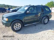 ✅ 2004 Isuzu Rodeo S • VIN: 4S2CK58Y544305012 • Lot: 43027958. Listed on IAAI with 125,526 mi. Free auction sales archive from the USA and detailed vehicle history report at DreamBid. Image 17.