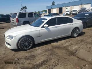 ✅ 2015 BMW 7 Series 750Li xDrive • VIN: WBAYF8C55FD654448 • Lot: 65222575. Listed on Copart with 106,082 mi. Free auction sales archive from the USA and detailed vehicle history report at DreamBid. Image 1.