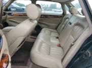 ✅ 1999 Jaguar XJ • VIN: SAJHX1044XC865054 • Lot: 57825325. Wystawiony na Copart z przebiegiem 71 145 mil. Bezpłatny archiwum sprzedaży aukcyjnych z USA i szczegółowy raport historii pojazdu na DreamBid. Zdjęcie 10.