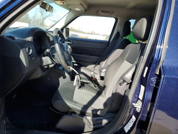 ✅ 2014 Jeep Patriot Latitude • VIN: 1C4NJRFBXED694339 • Lot: 91081835. Listed on Copart with 59,876 mi. Free auction sales archive from the USA and detailed vehicle history report at DreamBid. Image 7.