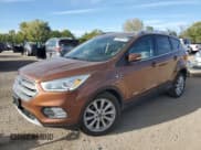 ✅ 2017 Ford Escape Titanium • VIN: 1FMCU9J93HUB58951 • Lot: 85857115. Listed on Copart with 100,409 mi. Free auction sales archive from the USA and detailed vehicle history report at DreamBid. Image 1.
