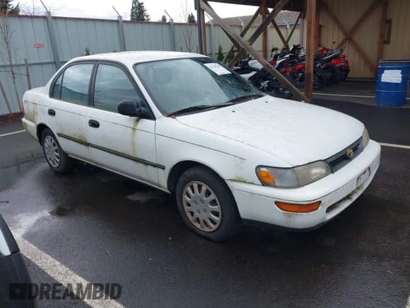 ✅ 1995 Toyota Corolla DX • VIN: 1NXAE09B9SZ288571 • Lot: 41789288. Wystawiony na IAAI z przebiegiem 181 236 mil. Bezpłatny archiwum sprzedaży aukcyjnych z USA i szczegółowy raport historii pojazdu na DreamBid. Zdjęcie 1.