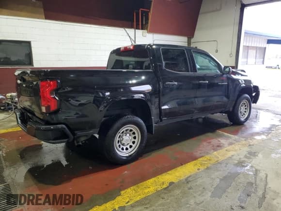 ✅ 2023 Chevrolet Colorado 2WD Work Truck • VIN: 1GCGSBEC6P1261029 • Лот: 89803525. Опубликован ранее на Copart с пробегом 24 369 миль. Бесплатный доступ к архиву аукционных продаж из США и подробный отчёт об истории автомобиля на DreamBid. Изображение 3.