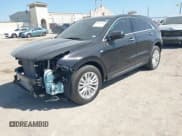 ✅ 2024 Cadillac XT4 FWD Luxury • VIN: 1GYAZAR41RF247456 • Lot: 42005721. Wystawiony na IAAI z przebiegiem 14 069 mil. Bezpłatny archiwum sprzedaży aukcyjnych z USA i szczegółowy raport historii pojazdu na DreamBid. Zdjęcie 2.