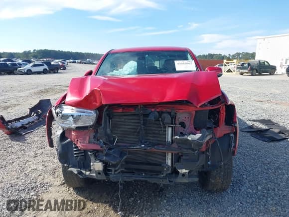 ✅ 2023 Toyota Tacoma SR5 • VIN: 3TYAZ5CN4PT038597 • Лот: 43353967. Опубликован ранее на IAAI с пробегом 62 258 миль. Бесплатный доступ к архиву аукционных продаж из США и подробный отчёт об истории автомобиля на DreamBid. Изображение 13.