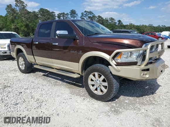 ✅ 2015 Ram 3500 Laramie Longhorn • VIN: 3C63R3FL1FG583230 • Lot: 52860315. Listed on Copart with 133,601 mi. Free auction sales archive from the USA and detailed vehicle history report at DreamBid. Image 4.
