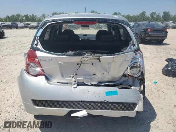 2009 Chevrolet Aveo 1LT with VIN KL1TD66E09B338773, listed as a Copart auction lot 52575765 with 102,617 mi miles and Salvage title. Bid and sale history available at DreamBid. Image 6.