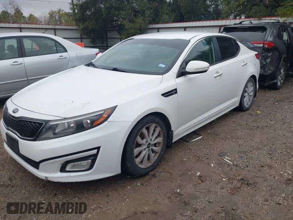 ✅ 2015 Kia Optima LX • VIN: KNAGM4A78F5620674 • Lot: 43831135. Listed on IAAI with 162,051 mi. Free auction sales archive from the USA and detailed vehicle history report at DreamBid. Image 2.