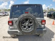 ✅ 2023 Jeep Wrangler Willys • VIN: 1C4HJXDNXPW522558 • Lot: 84778045. Listed on Copart with 40,465 mi. Free auction sales archive from the USA and detailed vehicle history report at DreamBid. Image 6.