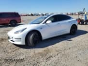✅ 2020 Tesla Model 3 Standard Range Plus • VIN: 5YJ3E1EA0LF631052 • Lot: 86877525. Wystawiony na Copart z przebiegiem 86 916 mil. Bezpłatny archiwum sprzedaży aukcyjnych z USA i szczegółowy raport historii pojazdu na DreamBid. Zdjęcie 1.