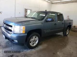 2007 Chevrolet Silverado 1500 1LT with VIN 2GCEK13M571733180, listed as a Copart auction lot 87206355 with 220,182 mi miles and Salvage title. Bid and sale history available at DreamBid. Image 1.