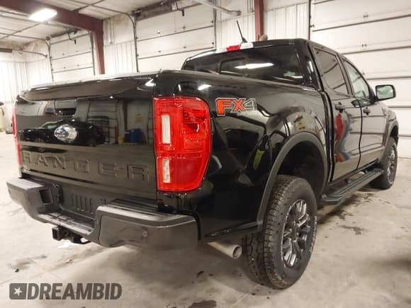 ✅ 2023 Ford Ranger XL • VIN: 1FTER4FH8PLE17858 • Lot: 41710721. Listed on IAAI with 5,299 mi. Free auction sales archive from the USA and detailed vehicle history report at DreamBid. Image 4.