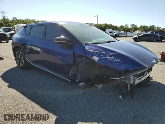 ✅ 2023 Kia EV6 Wind • VIN: KNDC34LA3P5612125 • Lot: 69844545. Wystawiony na Copart z przebiegiem 29 352 mil. Bezpłatny archiwum sprzedaży aukcyjnych z USA i szczegółowy raport historii pojazdu na DreamBid. Zdjęcie 4.