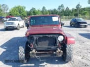 ✅ 2007 Jeep Wrangler Unlimited Sahara • VIN: 1J8GA59187L211825 • Lot: 42313099. Listed on IAAI with 107,554 mi. Free auction sales archive from the USA and detailed vehicle history report at DreamBid. Image 13.