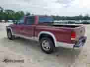 2003 Dodge Dakota SLT z VIN 1D7HL48X73S114322, wystawiony jako Copart lot #69361515 z przebiegiem 224 225 mil mil oraz Szkoda całkowita • Salvage title. Historia ofert i sprzedaży dostępna na DreamBid. Obrazek 2.