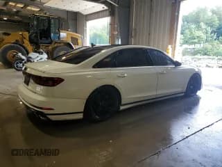 ✅ 2020 Audi S8 • VIN: WAU8SAF8XLN001077 • Лот: 68190125. Опубликован ранее на Copart с пробегом 61 235 миль. Бесплатный доступ к архиву аукционных продаж из США и подробный отчёт об истории автомобиля на DreamBid. Изображение 3.