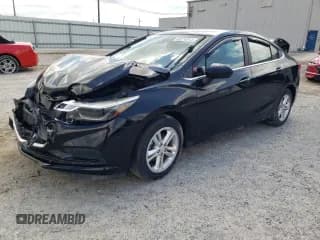 ✅ 2017 Chevrolet Cruze LT • VIN: 1G1BE5SM6H7105919 • Lot: 46276243. Listed on Copart with 96,872 mi. Free auction sales archive from the USA and detailed vehicle history report at DreamBid. Image 1.