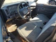 ✅ 1993 Nissan Frontier • VIN: 1N6SD11S1PC320341 • Lot: 43697755. Listed on Copart with 259,472 mi. Free auction sales archive from the USA and detailed vehicle history report at DreamBid. Image 8.