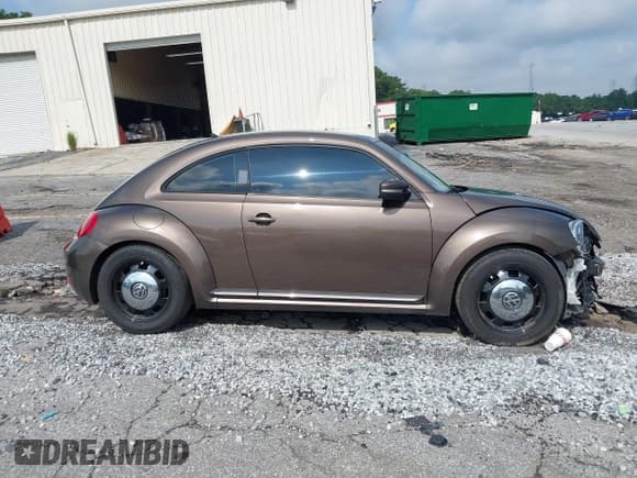 ✅ 2014 Volkswagen Beetle 1.8T • VIN: 3VWJ07AT2EM664064 • Lot: 43036687. Listed on IAAI with 112,000 mi. Free auction sales archive from the USA and detailed vehicle history report at DreamBid. Image 14.