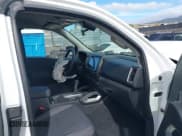 ✅ 2024 Nissan Frontier S • VIN: 1N6ED1CM1RN660317 • Lot: 41086992. Listed on IAAI with 4,933 mi. Free auction sales archive from the USA and detailed vehicle history report at DreamBid. Image 5.